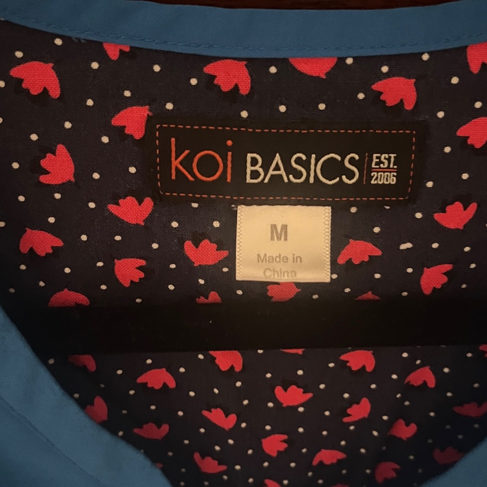 Royal Blue Scrub Set with Floral Lining by Koi - Picture 2 of 5